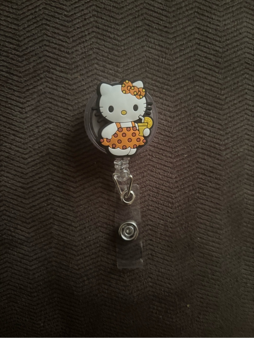 Hello Kitty Orange Polka Dot Retractable Badge Reel